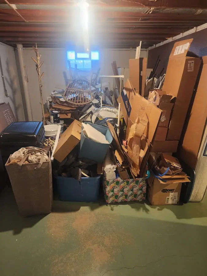 Roll-off dumpster container at job site for 20 Yard Dumpster Rental in Rocky Mount